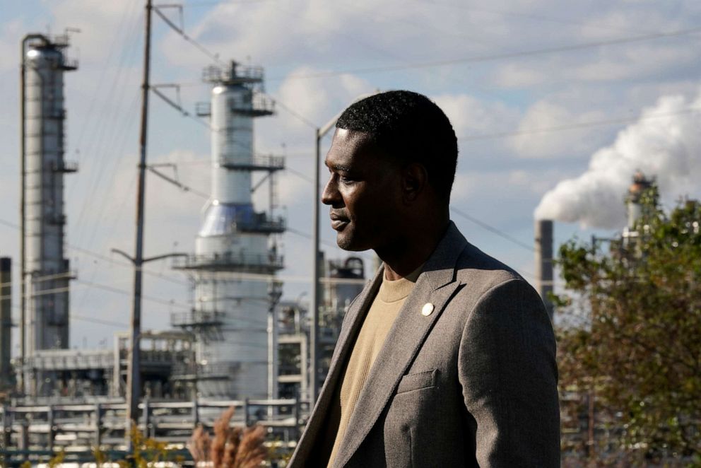 PHOTO: In this Nov. 16, 2021, file photo, EPA Administrator Michael Regan stands near the Marathon Petroleum Refinery as he conducts a television interview, while touring neighborhoods that abut the refinery, in Reserve, La.