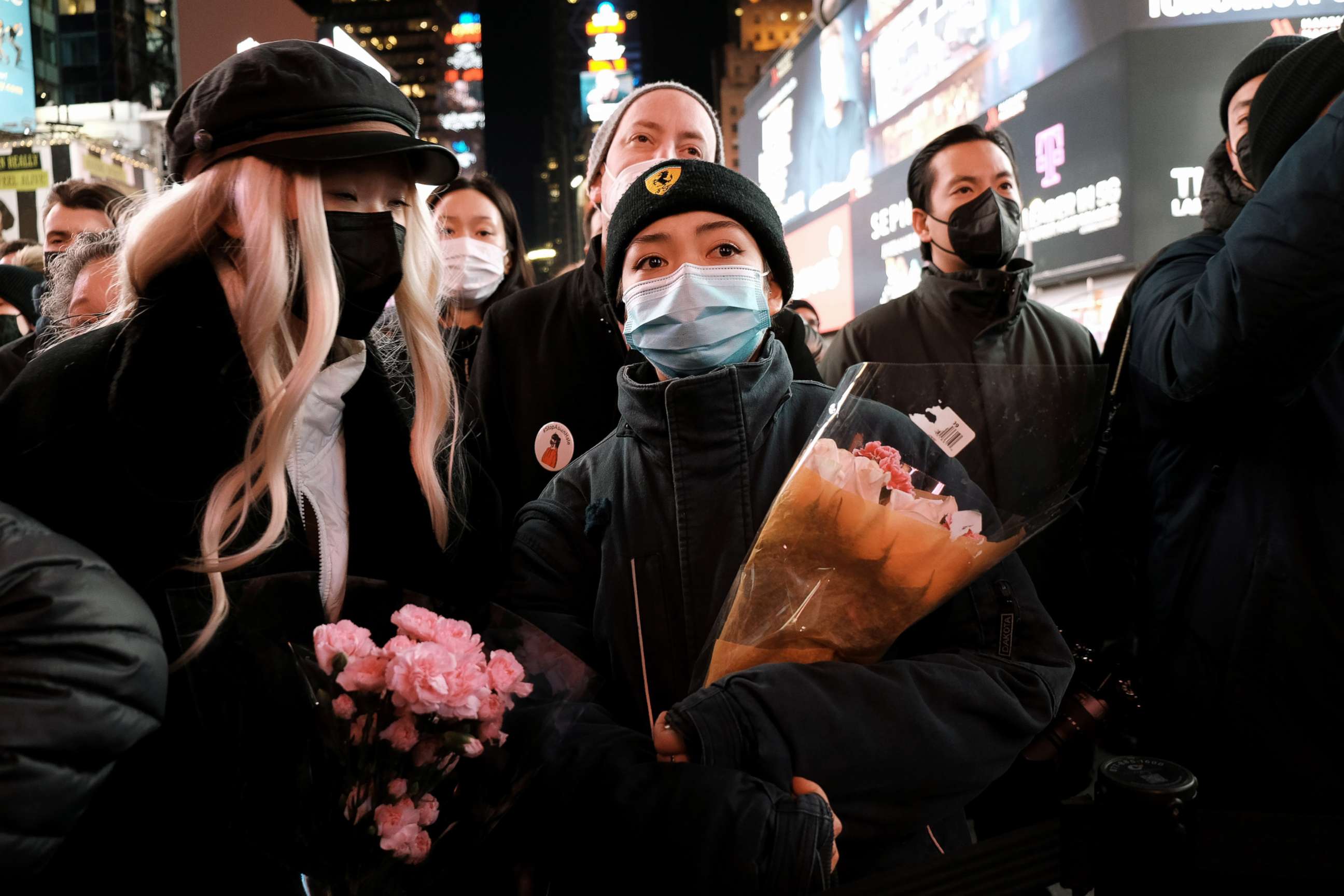 PHOTO: Local politicians, activists and members of the public attend an evening vigil for Michelle Go, who was killed on Jan. 18, 2022 in New York City. Go was pushed by a stranger in front of a train at the Times Square subway station.