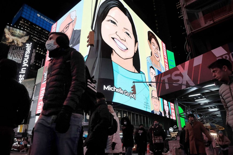 PHOTO: Local politicians, activists and members of the public attend an evening vigil for Michelle Go, who was killed on Jan. 18, 2022 in New York City. Go was pushed by a stranger in front of a train at the Times Square subway station.