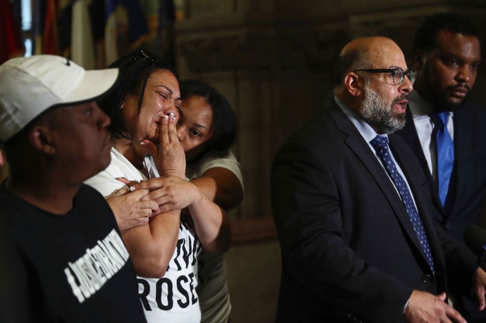 PHOTO: Michelle Kenney, the mother of Antwon Rose Jr., reacts as attorney Fred Rabner addresses reporters at the Allegheny County Courthouse in Pittsburgh, Wednesday, June 27, 2018.