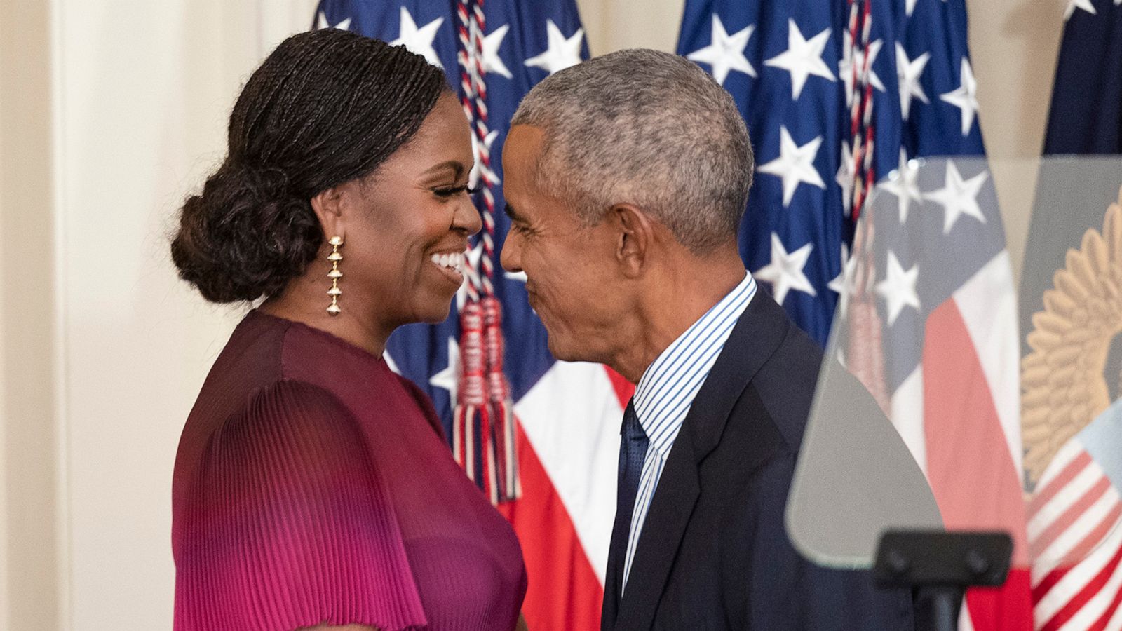 PHOTO: Former First Lady Michelle Obama and former U.S. President Barack Obama embrace at a ceremony to unveil their official White House portraits at the White House on Sept. 7, 2022.