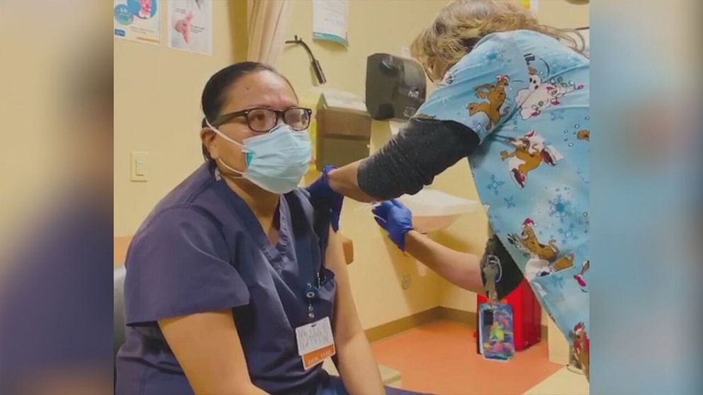 PHOTO: Dr. Michelle Tom, the only Navajo emergency physician at the Winslow Indian Health Care Center in Arizona, got her vaccine this week.