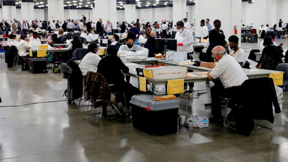 PHOTO: In this Nov. 4, 2020, file photo, election workers work on counting absentee ballots for the 2020 general election at TCF Center, on Nov. 4, 2020, in Detroit.