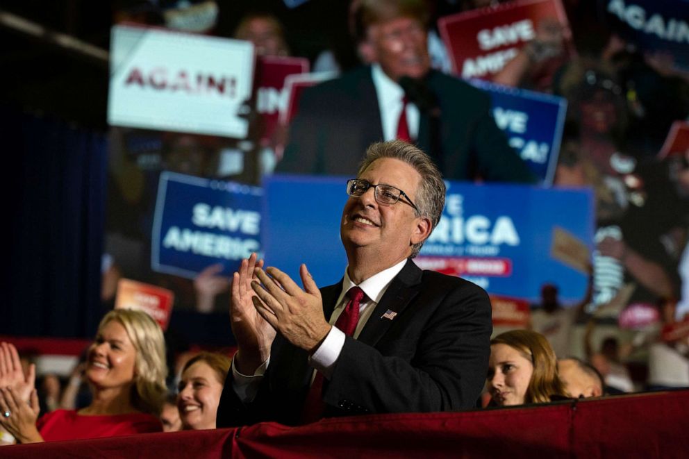 PHOTO: FILE - Republican candidate for Attorney General Matthew DePerno claps during former President Donald Trump's remarks during a Save America rally, Oct. 1, 2022 in Warren, Mich.