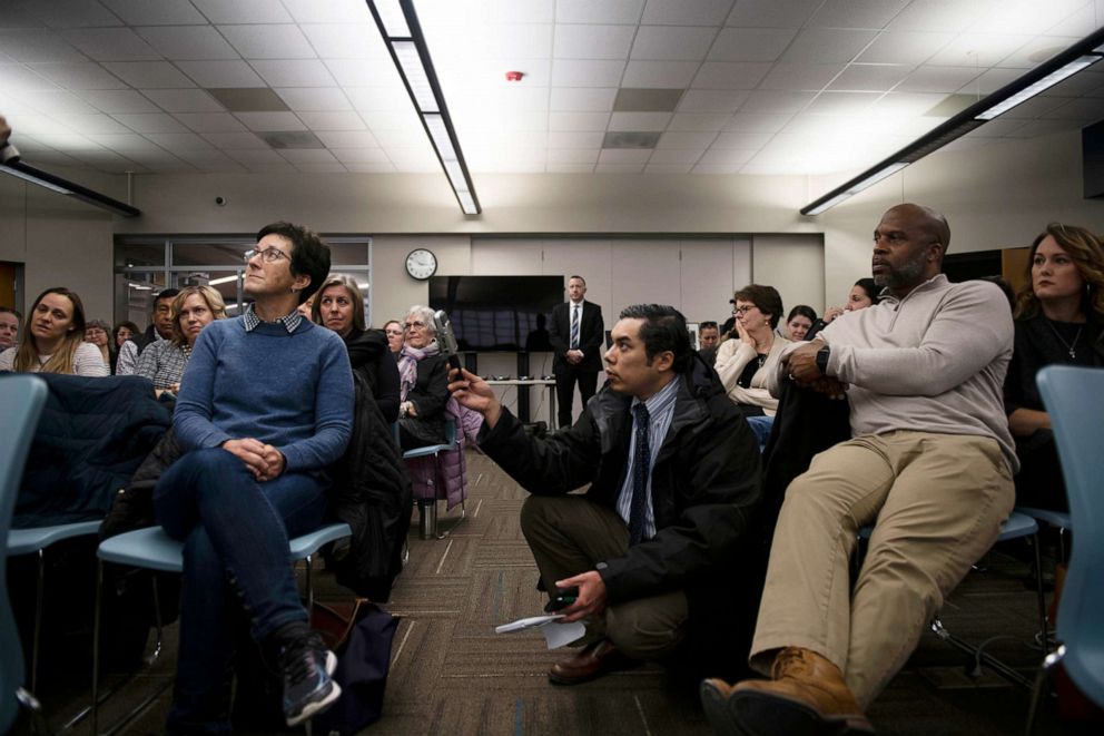 PHOTO: Parents discuss their experiences and opinions on racism in the Saline community and schools during a school diversity and inclusion meeting community meeting at Liberty School in Saline, Mich., Monday, Feb. 3, 2020.