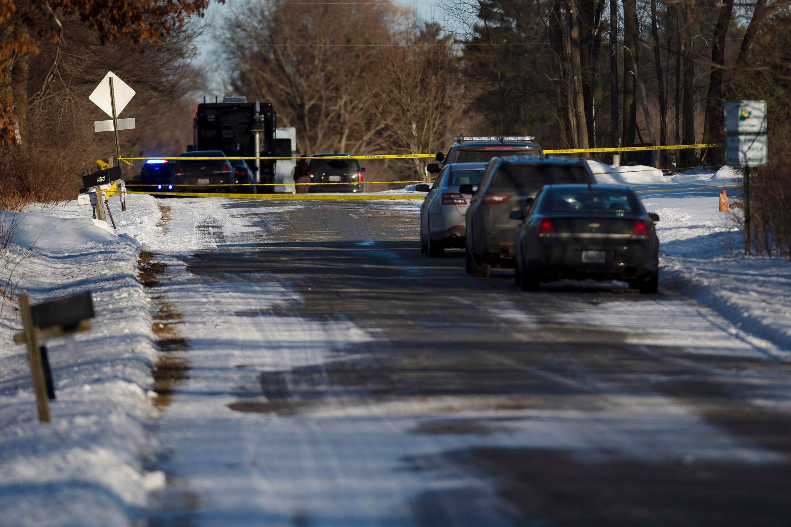 PHOTO: Kent County Sheriff personnel investigate the scene of a fatal shooting near Cedar Springs, Mich., Feb. 18, 2019.