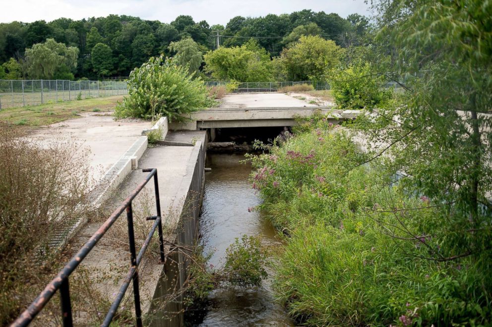 PHOTO: Rum Creek, a Rogue River tributary, flows through the former Wolverine World Wide tannery property in Rockford, Mich., Aug. 14, 2017.