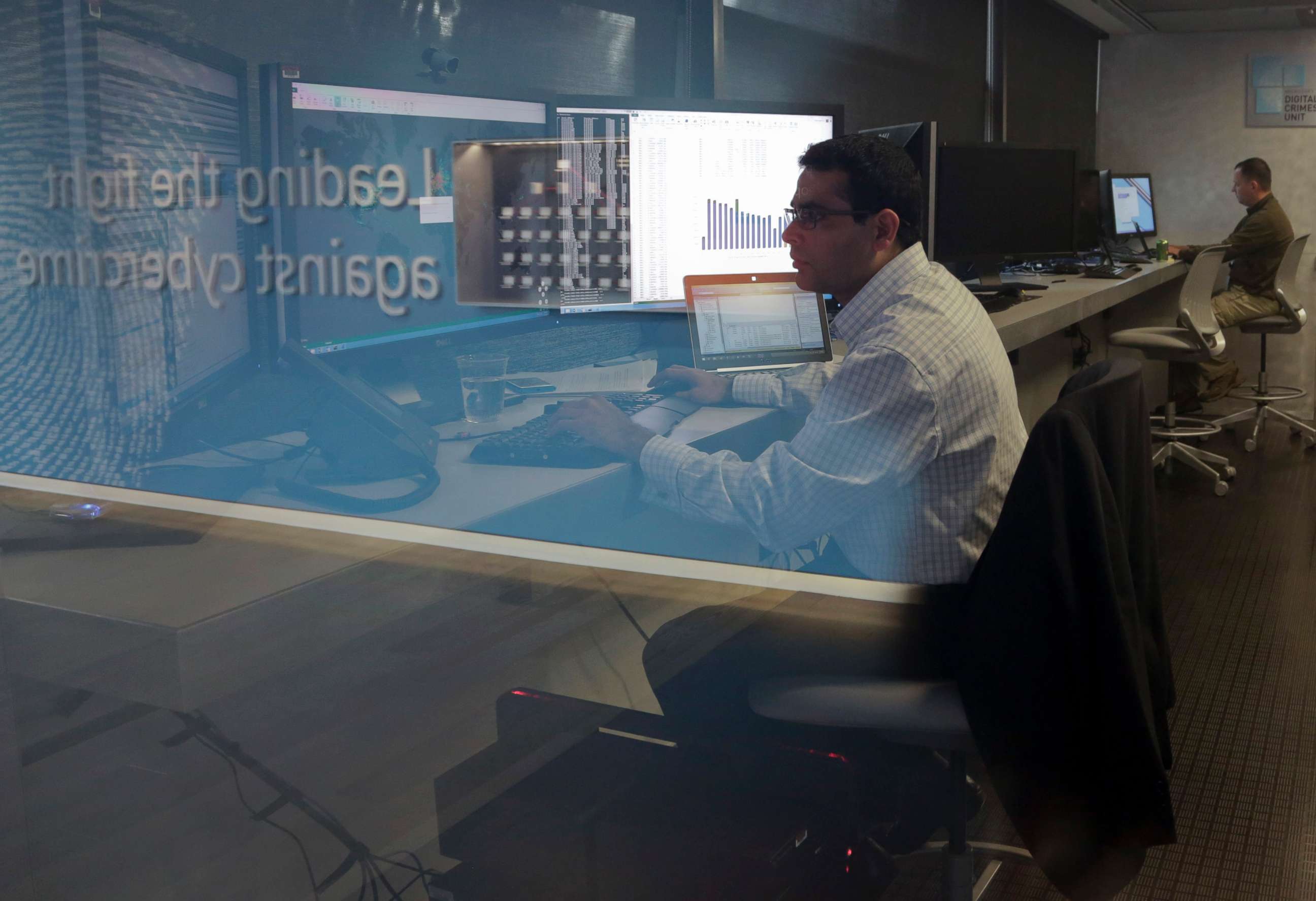 PHOTO: Vishant Patel, senior manager of investigations at the Microsoft Digital Crimes Unit, works in the unit's Malware Lab at the Microsoft Cybercrime Center in Redmond, Wash., Nov. 11, 2013.
