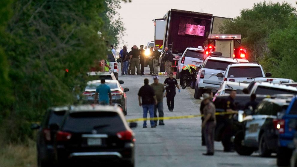 PHOTO: Police and other first responders work the scene where dozens of people were found dead and multiple others were taken to hospitals after a tractor-trailer containing suspected migrants was found on June 27, 2022, in San Antonio.