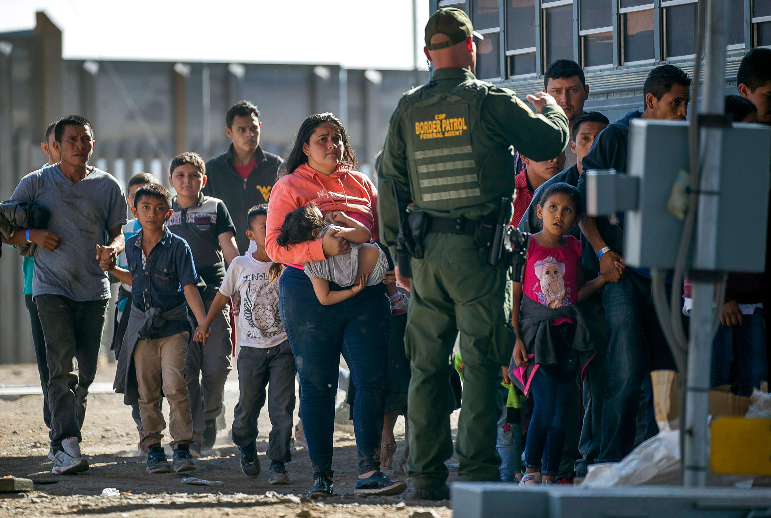 PHOTO: Migrants are loaded onto a bus by U.S. Border Patrol agents after being detained when they crossed into the United States from Mexico, June 1, 2019 in El Paso, Texas.