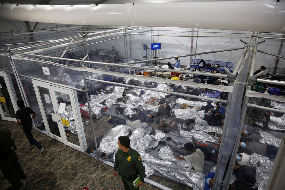 PHOTO: Children lie inside a pod at the U.S. Department of Homeland Security holding facility in Donna, Texas, on March 30, 2021.