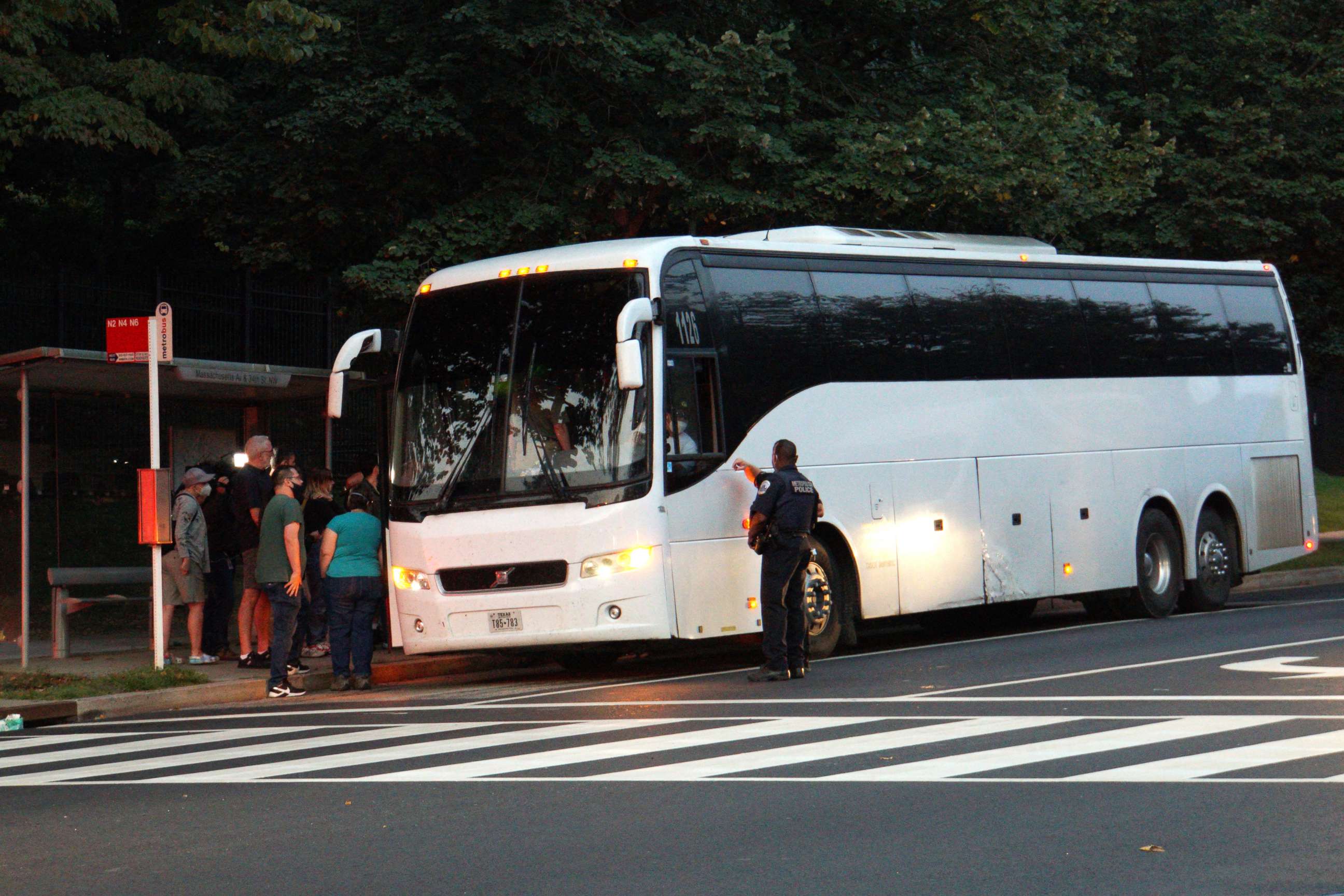 PHOTO: A group of mainly Venezuelan migrants, who were sent by bus from detention in Texas, are dropped off outside the Naval Observatory, the official residence of Vice President Kamala Harris in Washington, Sept. 17, 2022.