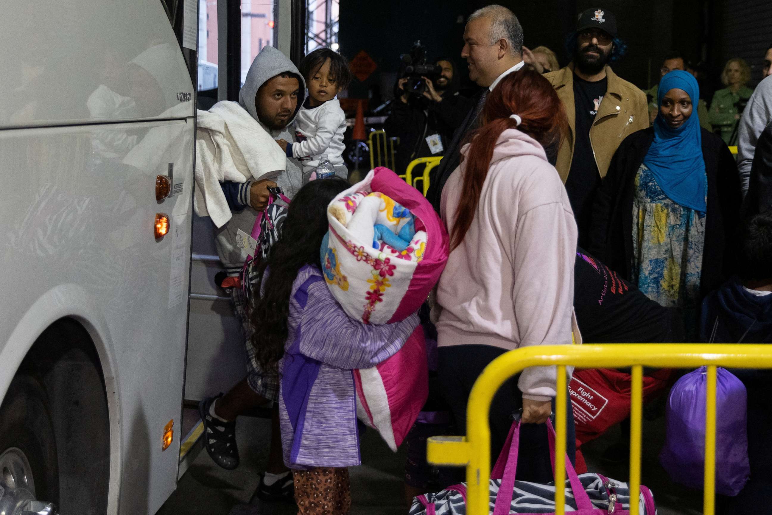 PHOTO: Migrants from Texas arrive at the Port Authority Bus Terminal in New York City on May 10, 2023.