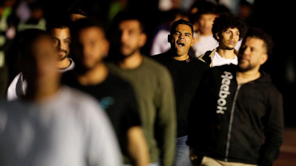 PHOTO: Venezuelan migrants look on following their arrival on a flight after being deported from the United States, in Caracas, Venezuela, Mar. 24, 2025.