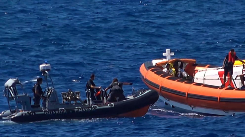 PHOTO: Migrants are rescued by NGO Proactiva Open Arms charity after throwing themselves in the water to try and swim to the nearby Italian island of Lampedusa, Aug. 20, 2019.