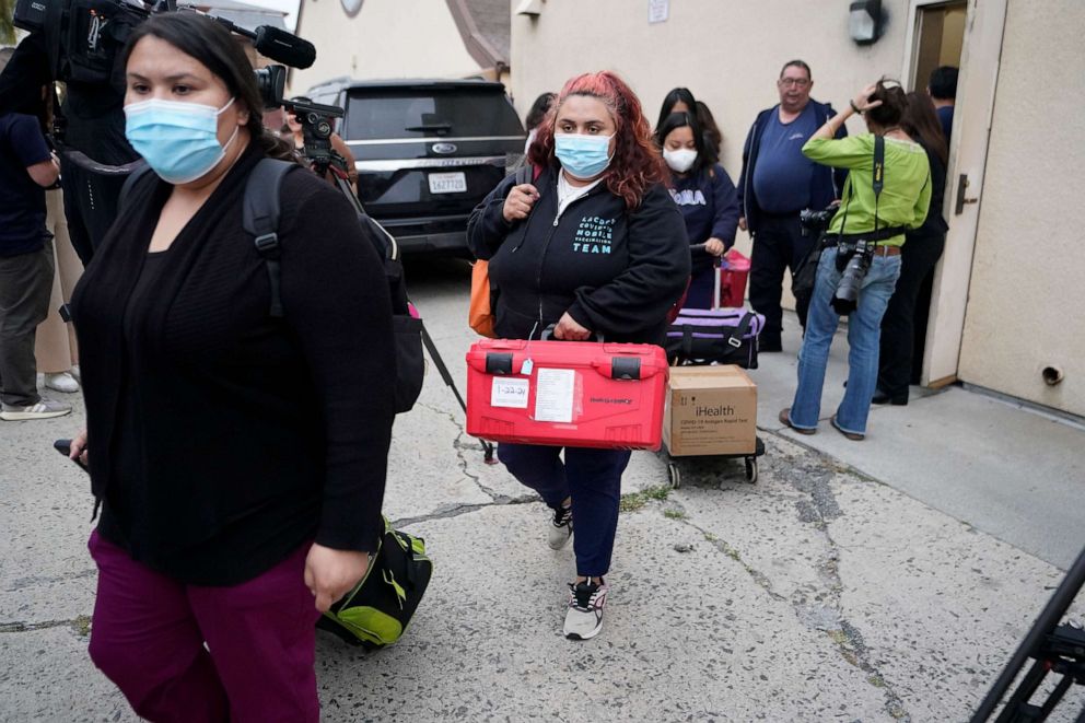 PHOTO: Los Angeles County Public Health Emergency Operations officials leave St. Anthony's Croatian Catholic Church after evaluating the newly arrived migrants being housed in Los Angeles on Wednesday, June 14, 2023.