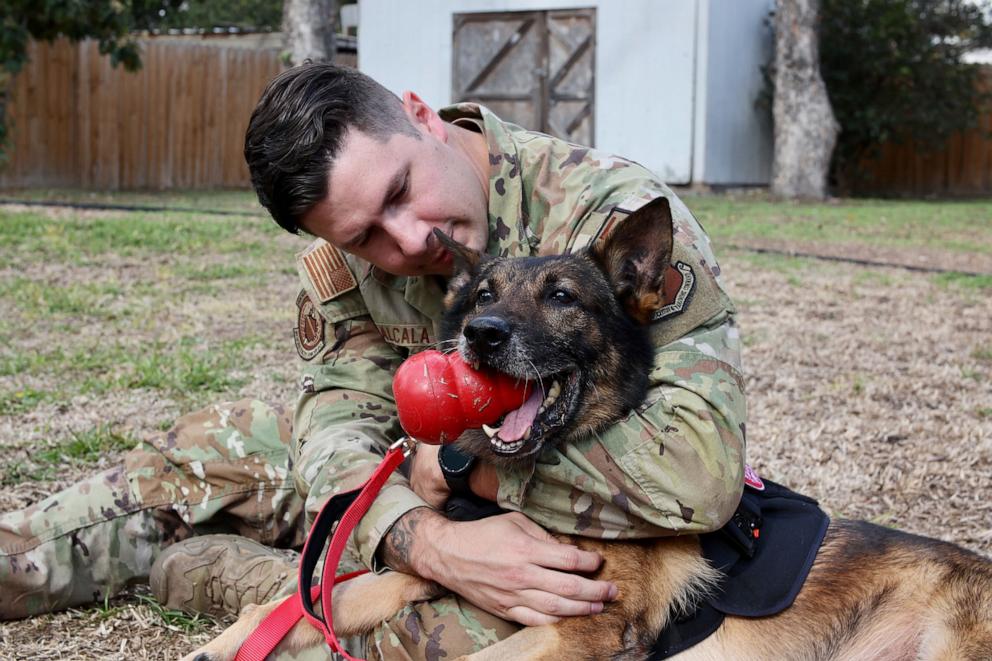 PHOTO: SSgt. Mike Alcala and John reunite after two years apart on Dec. 20, 2023, in San Antonio, Texas.