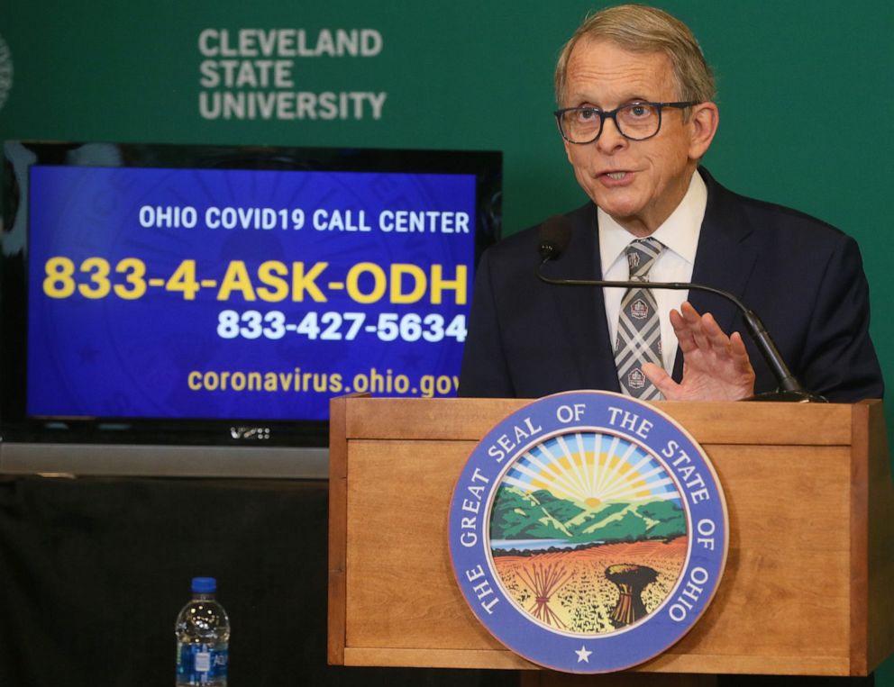 PHOTO: Ohio Governor Mike DeWine speaks about COVID-19 vaccines during a press conference at the Wolstein Center in Cleveland, April 27, 2021.
