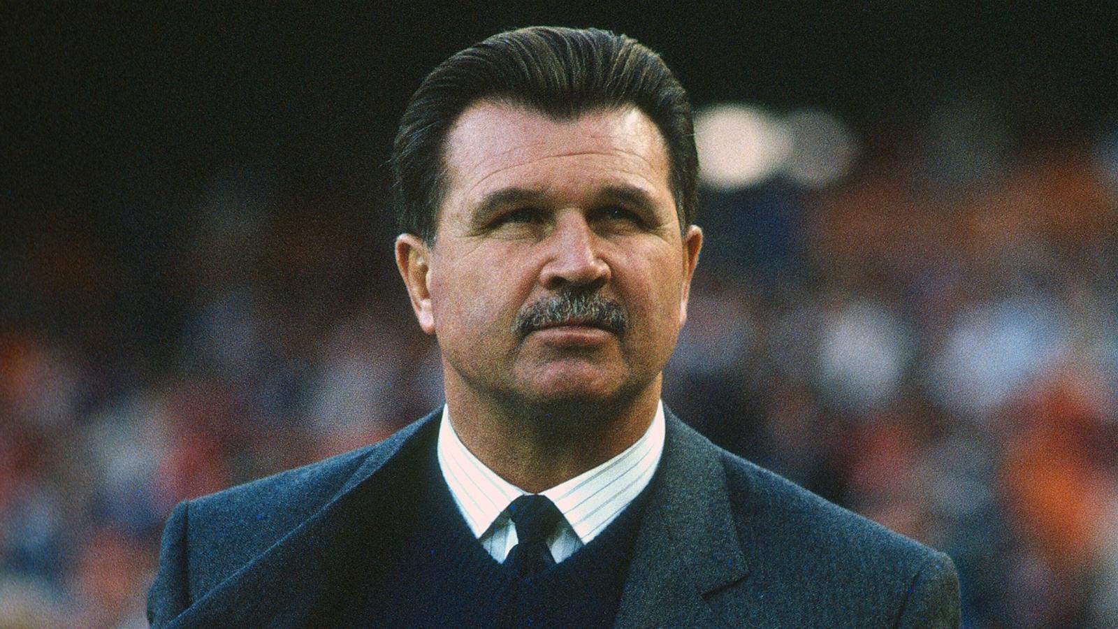 PHOTO: Head Coach Mike Ditka of the Chicago Bears looks on from the sidelines against the Washington Redskins during an NFL football game, Nov. 26, 1989, at RFK Stadium in Washington, D.C.