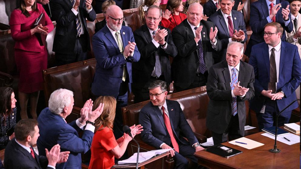 PHOTO: Republican members of the House of Representatives applaud Speaker of the House Mike Johnson after he was nominated by House Republican Conference Chair Lisa McClain during the first session of the 119th Congress in Washington, Jan. 3, 2025.