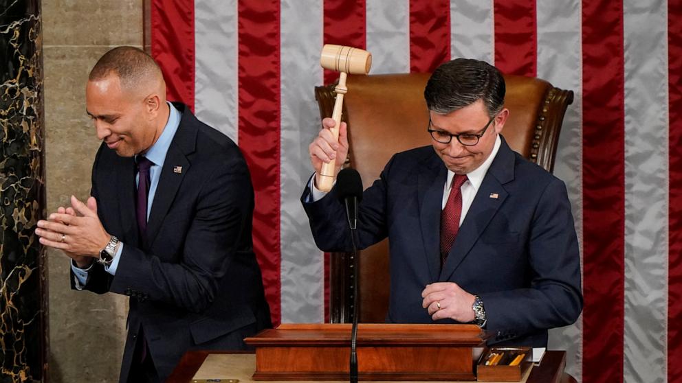 PHOTO: Rep. Mike Johnson holds the gavel after being presented it by Rep. Hakeem Jeffries after being re-elected as Speaker of the House on the first day of the 119th Congress at the U.S. Capitol in Washington, Jan. 3, 2025. 