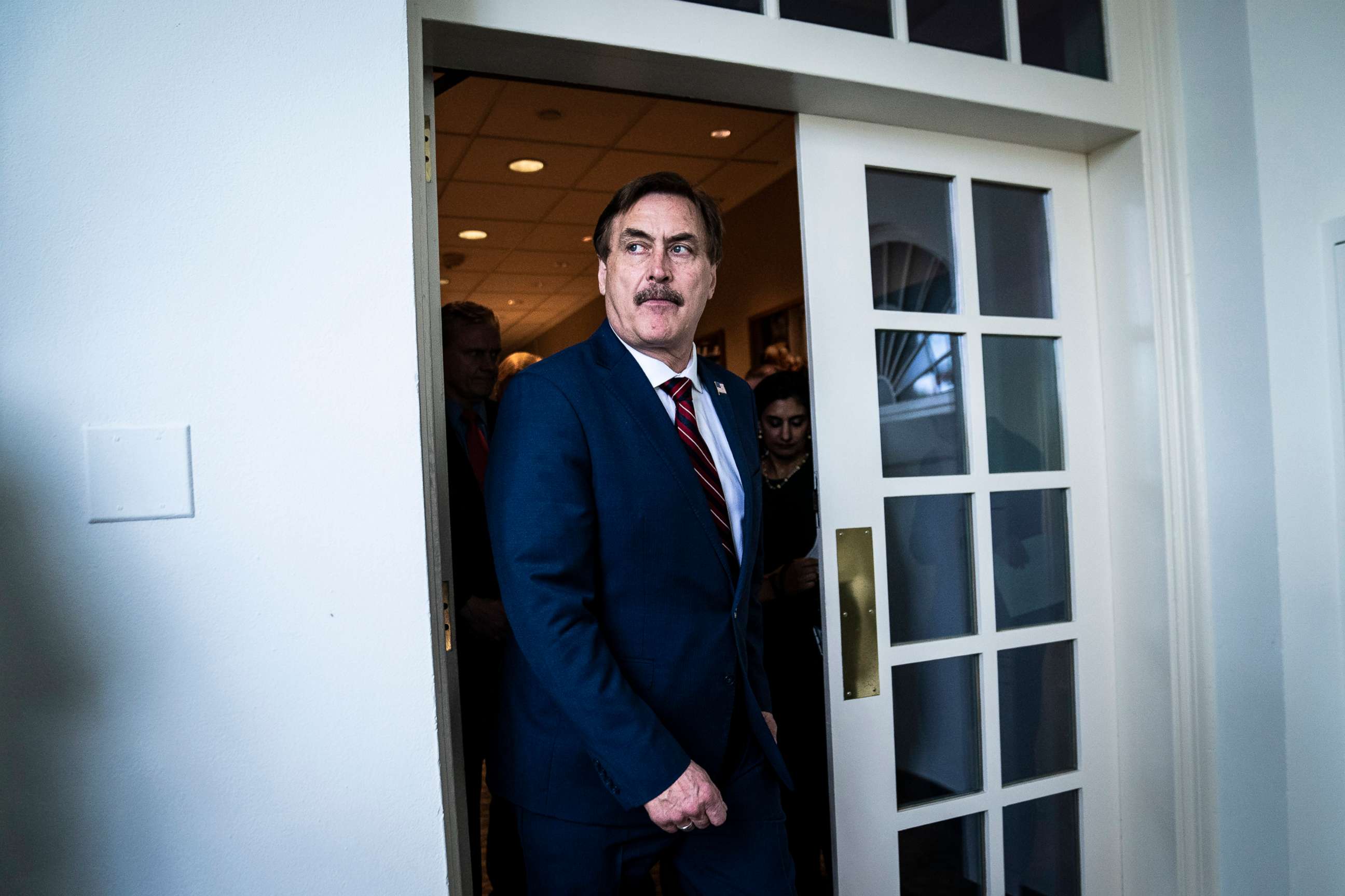 PHOTO: My Pillow CEO Mike Lindell walks out walks out of the White House ahead of a press conference with President Trump, March 30, 2020, in Washington, D.C.