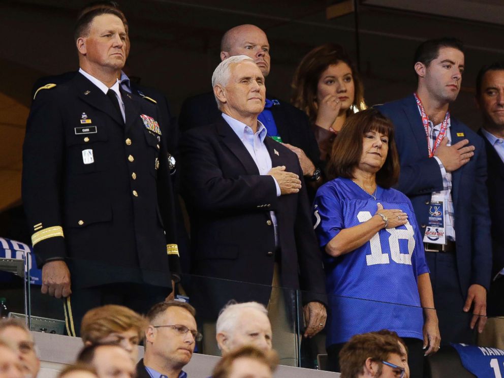 PHOTO: Vice President Mike Pence, front center, stands during the playing of the national anthem before an NFL football game between the Indianapolis Colts and the San Francisco 49ers, Oct. 8, 2017, in Indianapolis.
