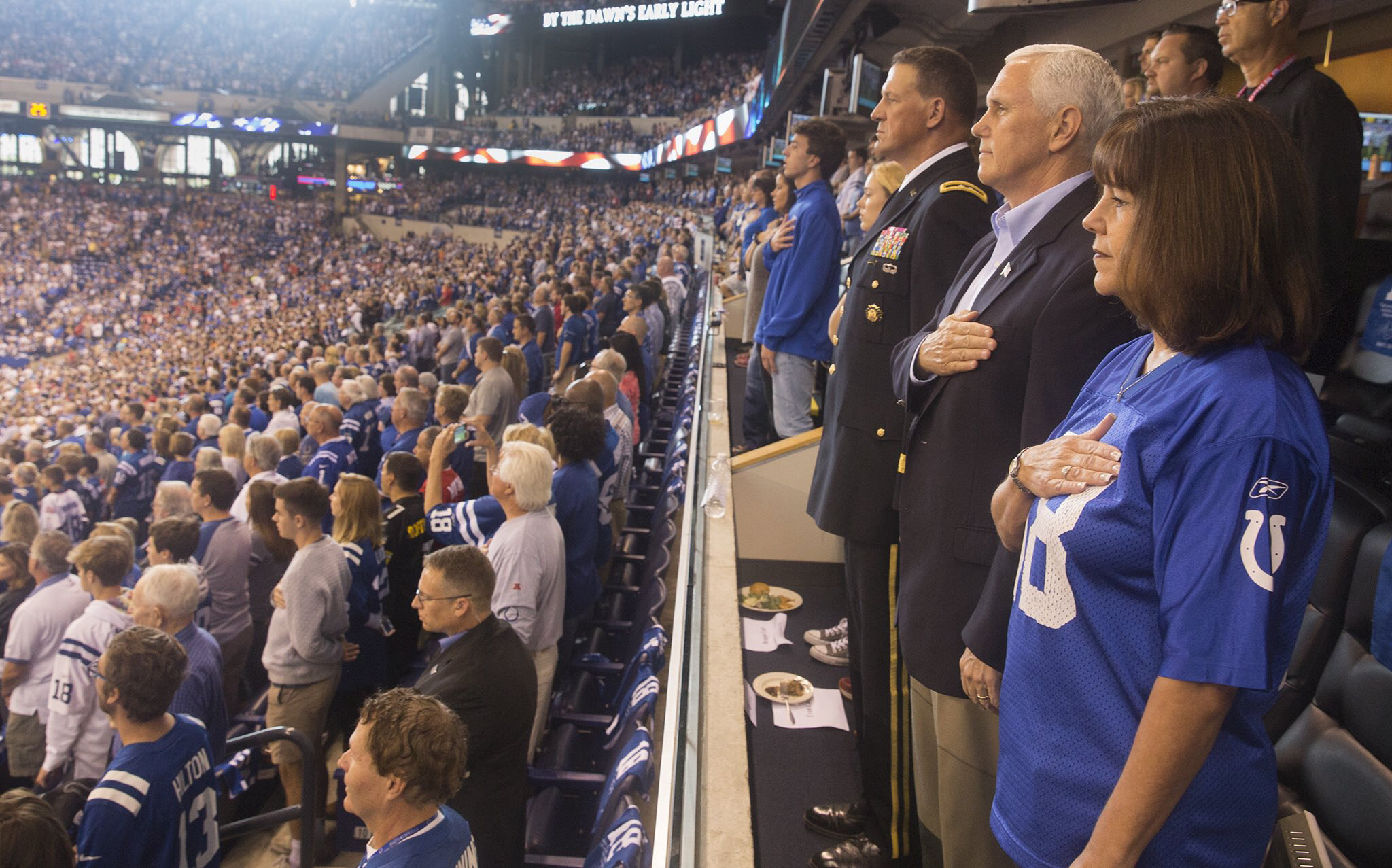PHOTO: Vice President Mike Pence (2nd R) and his wife Karen Pence (R) stand during the national anthem before the San Francisco 49ers at Indianapolis Colts NFL game, at Lucas Oil Stadium in Indianapolis, Oct. 8, 2017.