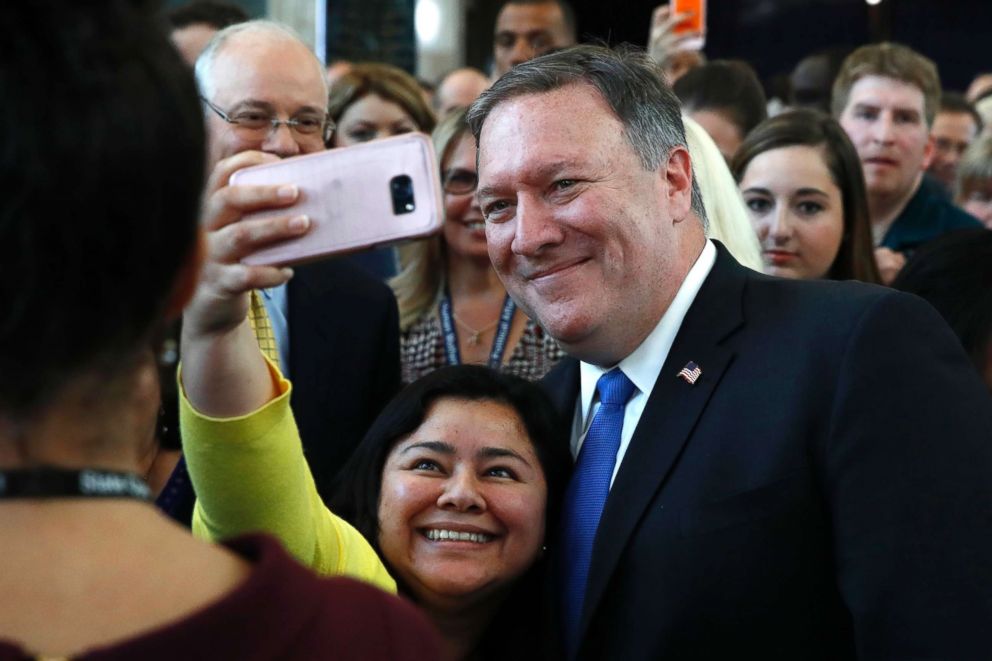 PHOTO: A State Department employee takes a selfie with new Secretary of State Mike Pompeo after he addressed State Department employees on his arrival at the State Department in Washington, May 1, 2018.