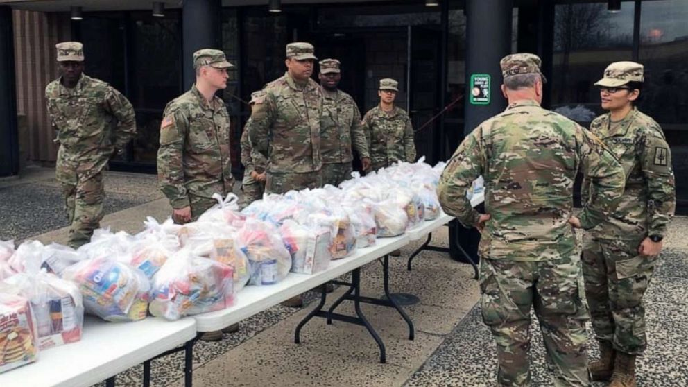 PHOTO: New York Army National Guard Soldiers distribute food parcels in Westchester County, N.Y. on March 12, 2020 as part of the New York State response to the effort to contain a cluster of coronavirus cases in New Rochelle, N.Y.