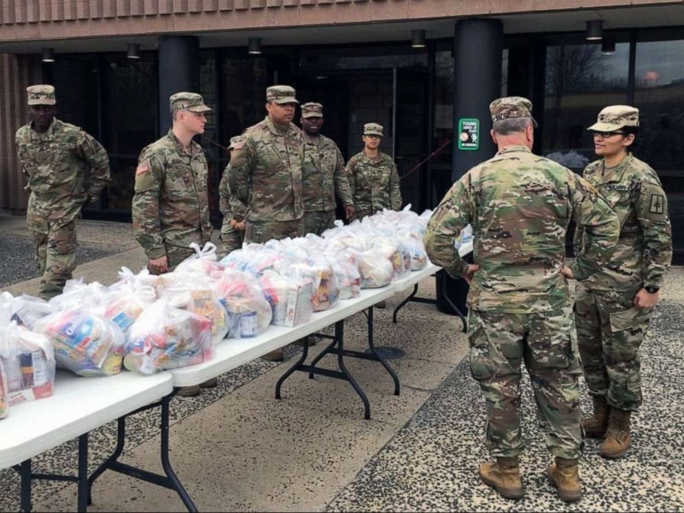 PHOTO: New York Army National Guard Soldiers distribute food parcels in Westchester County, N.Y. on March 12, 2020 as part of the New York State response to the effort to contain a cluster of coronavirus cases in New Rochelle, N.Y.