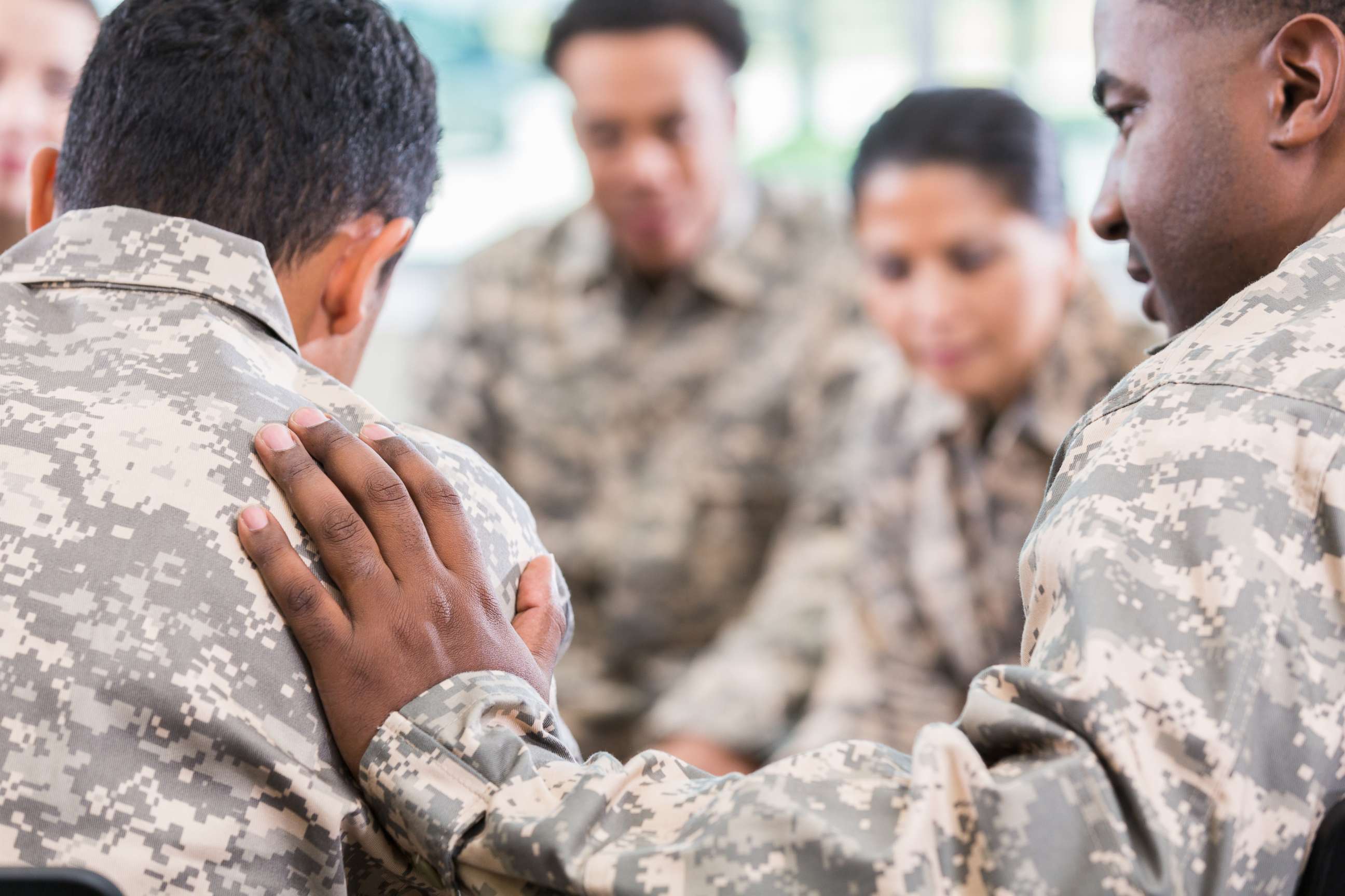 PHOTO: People in military uniform talk during a support group in an undated stock photo.