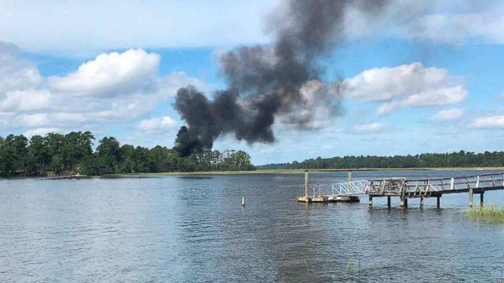 PHOTO: Smoke bellows from a military jet that crashed, Friday, Sept. 28, 2018 in Beaufort, S.C.