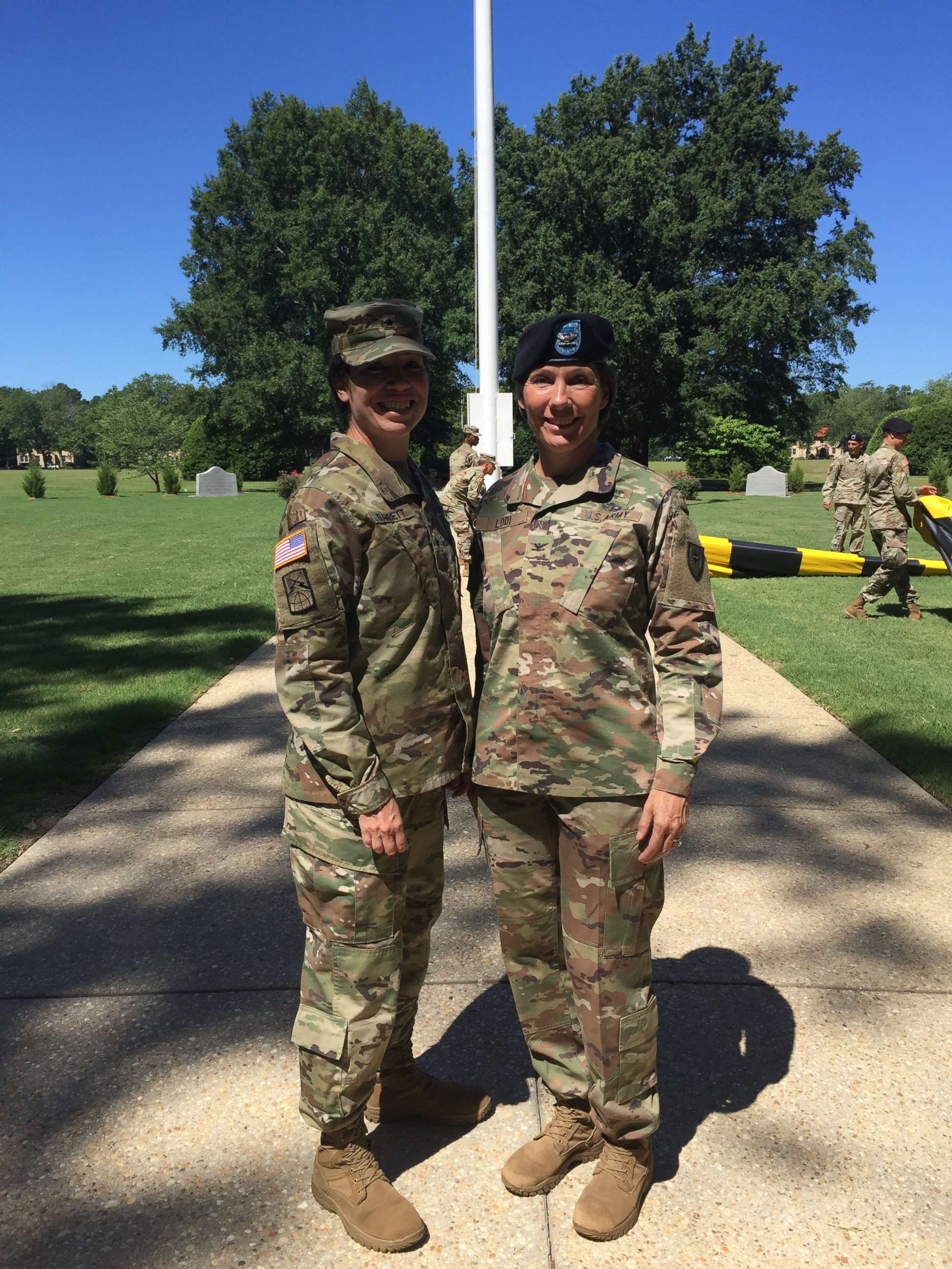 PHOTO: Maj. Gen. Maria Barrett and her sister, Brig. Gen. Paula Lodi, pose for a family photo after then Col. Lodi's outgoing Change of Command for the 44th Medical Brigade, Fort Bragg, N.C. in July 2018.