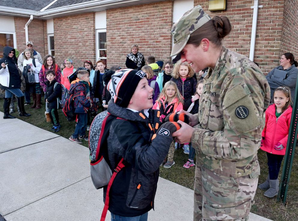 PHOTO: U.S. Army Sgt. Celeste McKenry returned home from Kuwait and surprised her son, Waylon Townsley, 7, as he was dropped off at the Friedens Lutheran Church daycare center after his day at the Oley Valley Elementary Center in Oley, Pa, Dec. 13, 2017. 