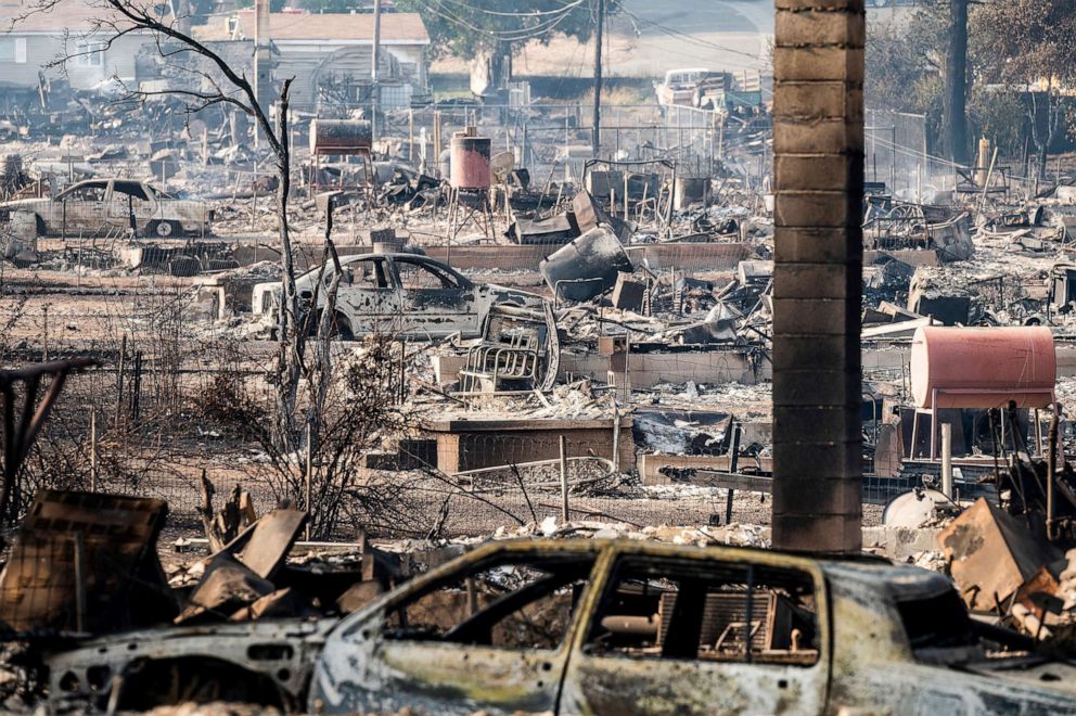 PHOTO: Homes and vehicles destroyed by the Mill Fire, Sept. 3, 2022, in Weed, Calif. 