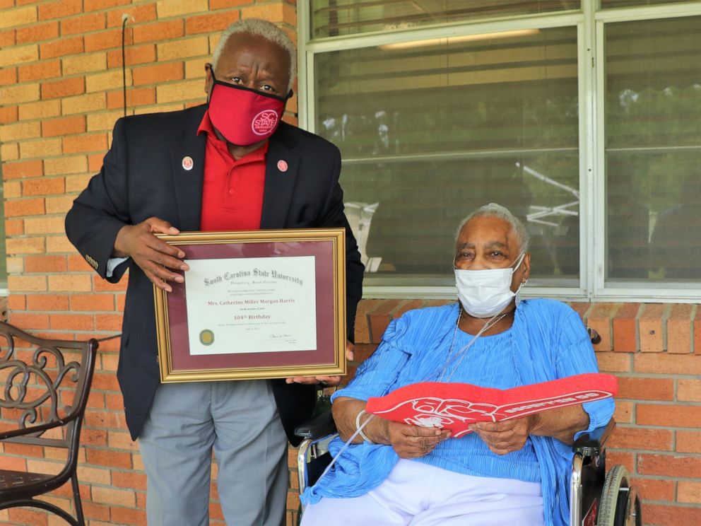 PHOTO: Catherine Miller celebrated her birthday on June 8 having survived a bout with COVID-19 last year. Miller, an alumna, was presented with certificate by James E. Clark, president of the university.
