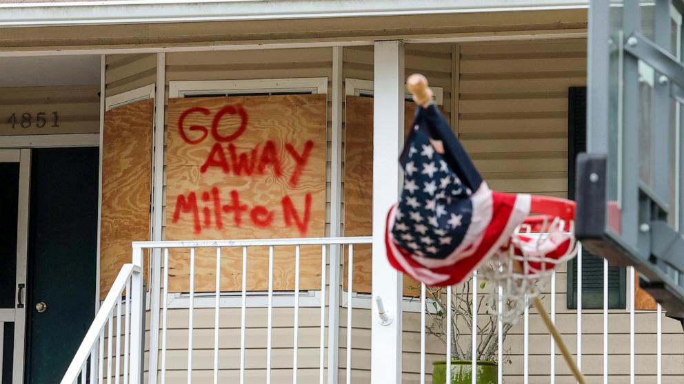 PHOTO: The home of the Weibel family is boarded up in preparation for Hurricane Milton, Oct. 7, 2024, in Port Richey, Fla.