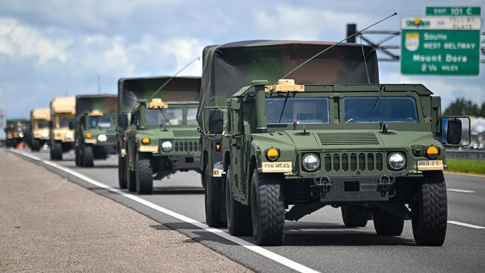 PHOTO: A military convoy is seen ahead of Hurricane Milton's expected mid-week landfall in Sanford, Fla., Oct. 8, 2024. 