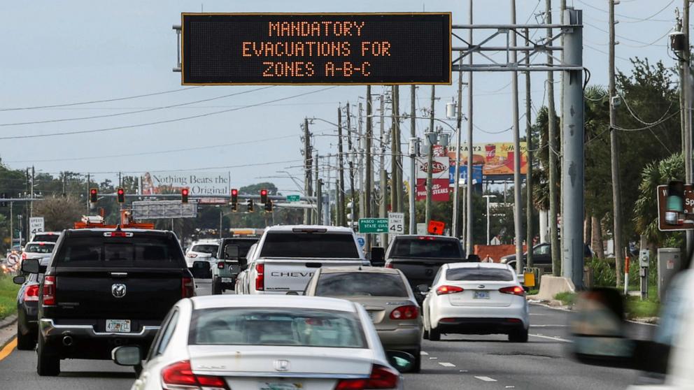 PHOTO: Highway signage announces the impending arrival of Hurricane Milton and the evacuations zones, Oct. 8, 2024, in Port Richey, Fla. 