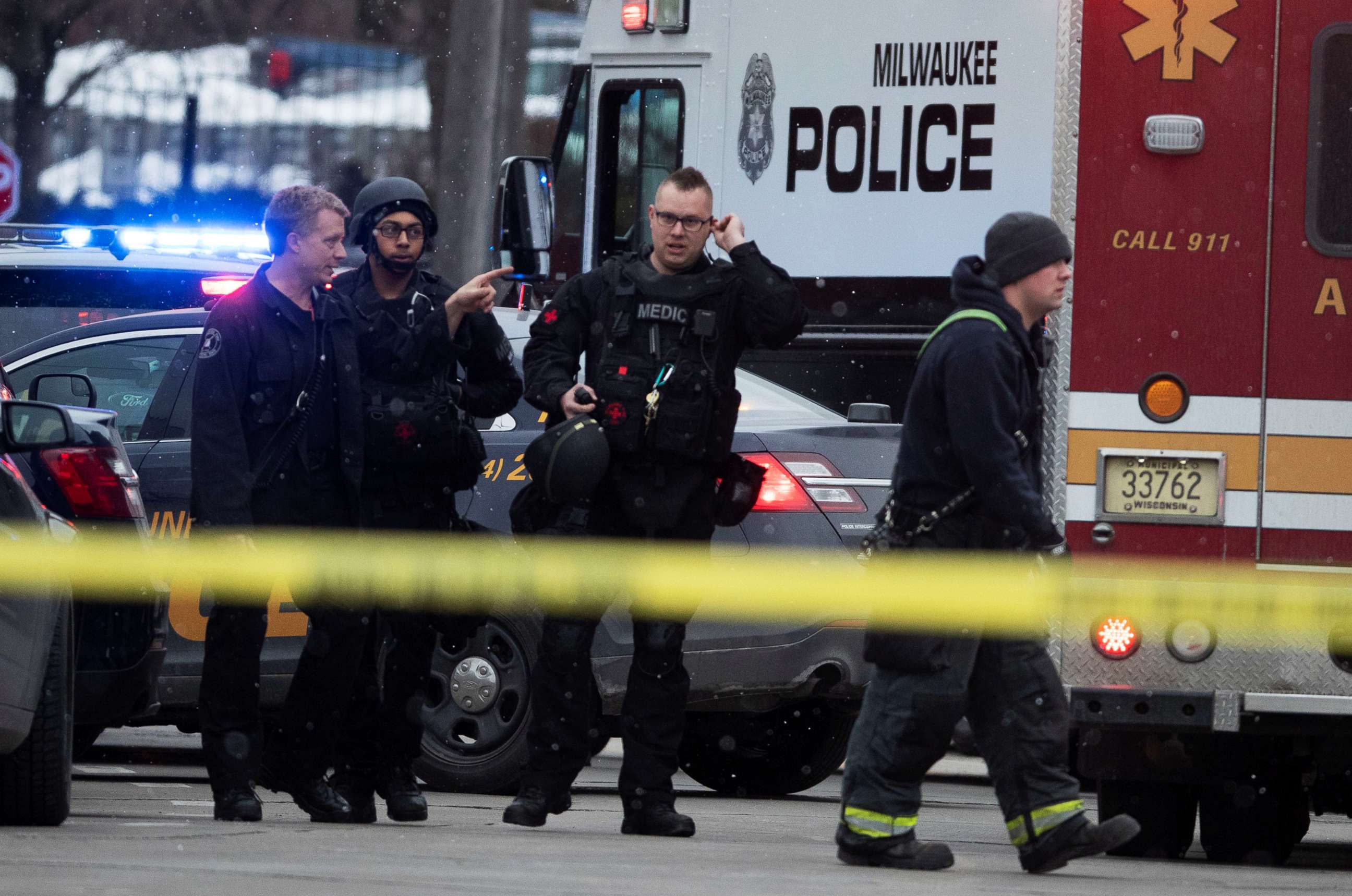 PHOTO: Police and emergency officials work at an active shooter scene at the Molson Coors headquarters in Milwaukee, Feb. 26, 2020. 