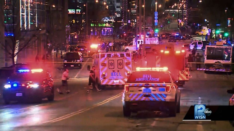 PHOTO: This photo taken from video provided by WISN 12 News shows police responding to the scene of a shooting at Water Street and Juneau Avenue in Milwaukee, May 13, 2022.