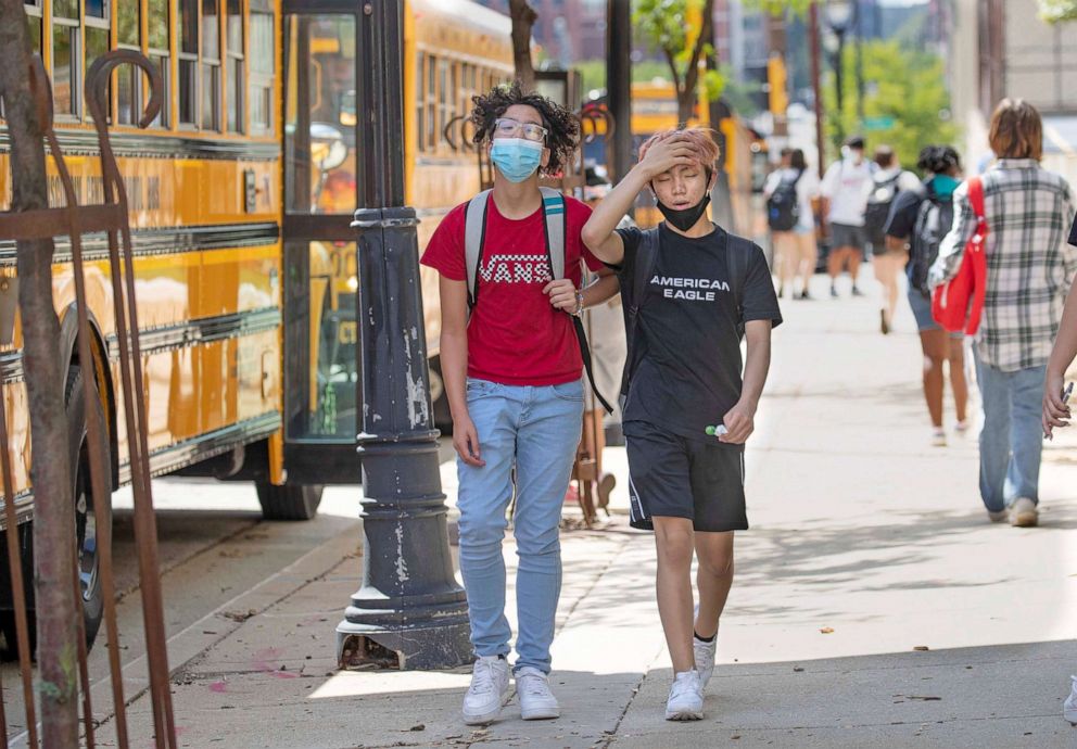 PHOTO: Students leave school early due to extreme heat at Golda Meir School in Milwaukee, Aug. 25, 2021.