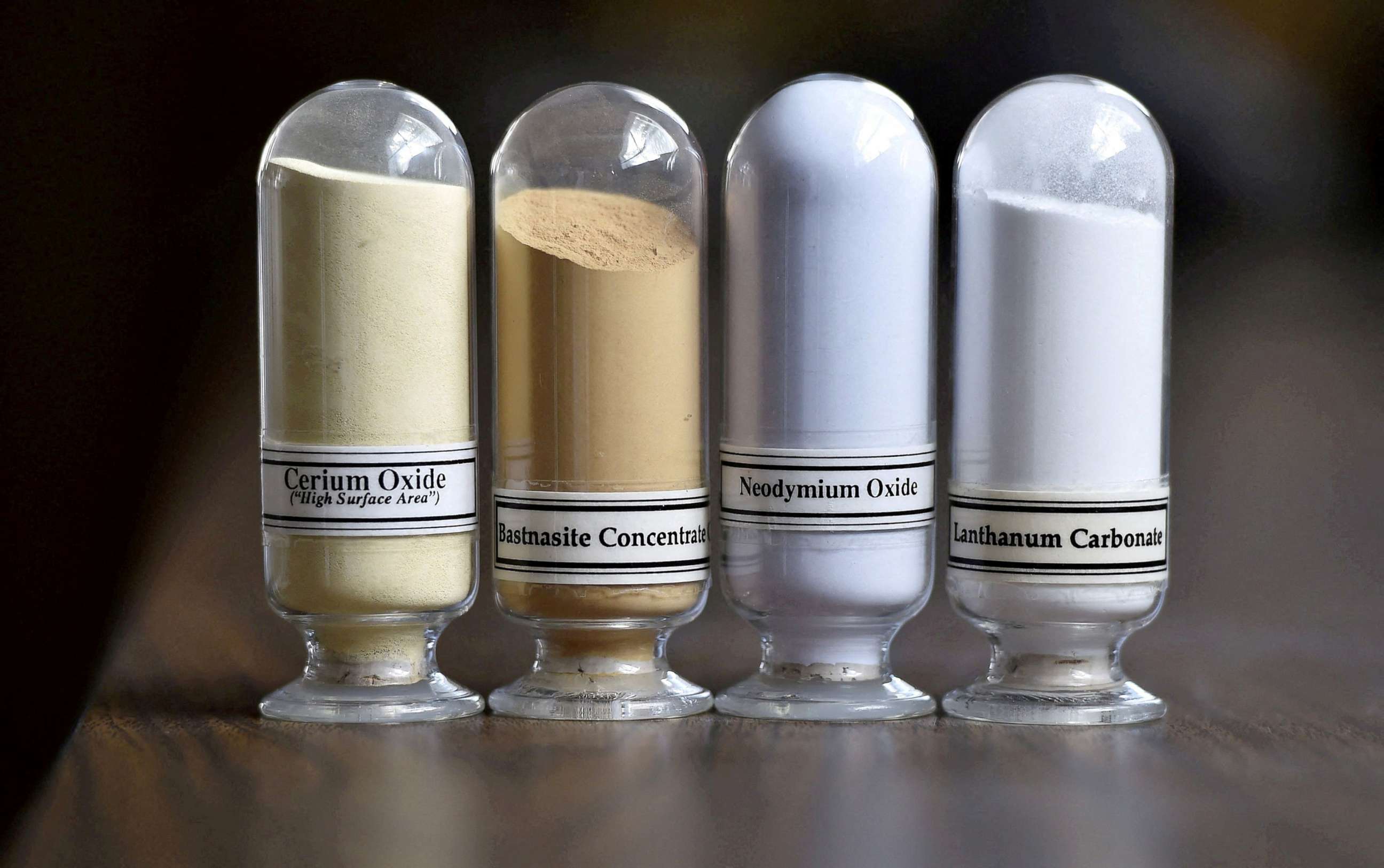 PHOTO: Samples of rare earth minerals, from left, Cerium oxide, Bastnaesite, Neodymium oxide and Lanthanum carbonate at Molycorp's Mountain Pass Rare Earth facility in Mountain Pass, Calif., June 29, 2015.