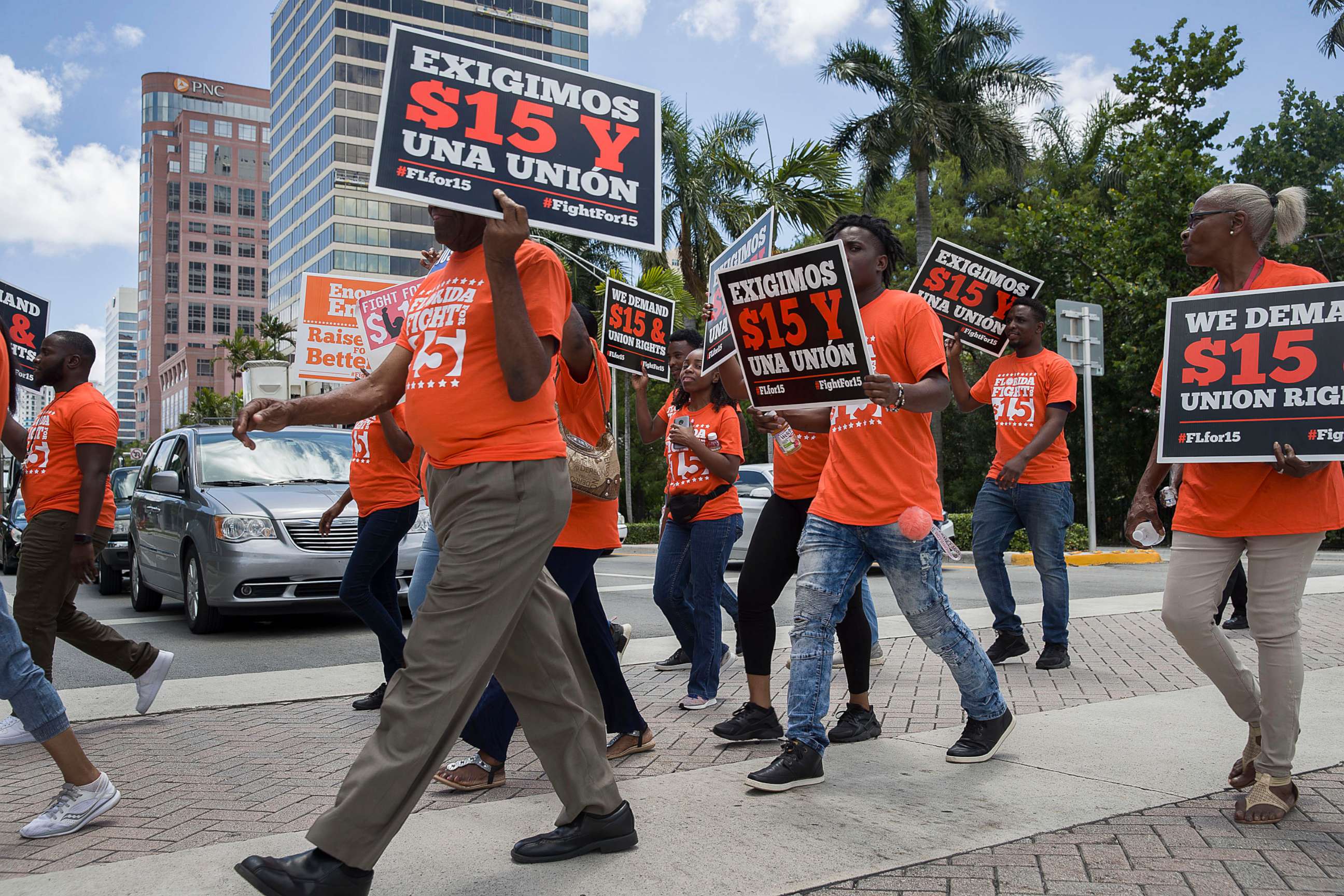 PHOTO: People march demand a raise in the minimum wage, May 23, 2019, in Fort Lauderdale, Fla.