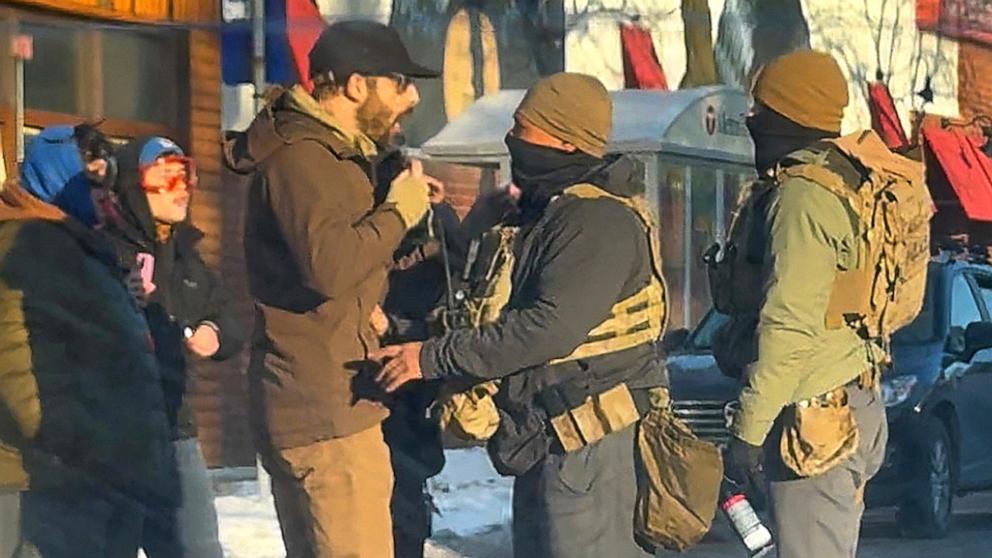 PHOTO: Alex Pretti is confronted by federal agents prior to being fatally shot in Minneapolis, Jan. 24, 2026.