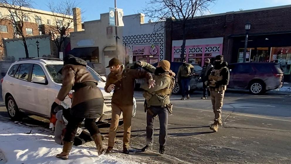PHOTO: A screengrab from a video obtained by Reuters shows a law enforcement officer spraying irritants at Alex Pretti, before he was fatally shot when federal agents were trying to detain him in Minneapolis, Minnesota, January 24, 2026.