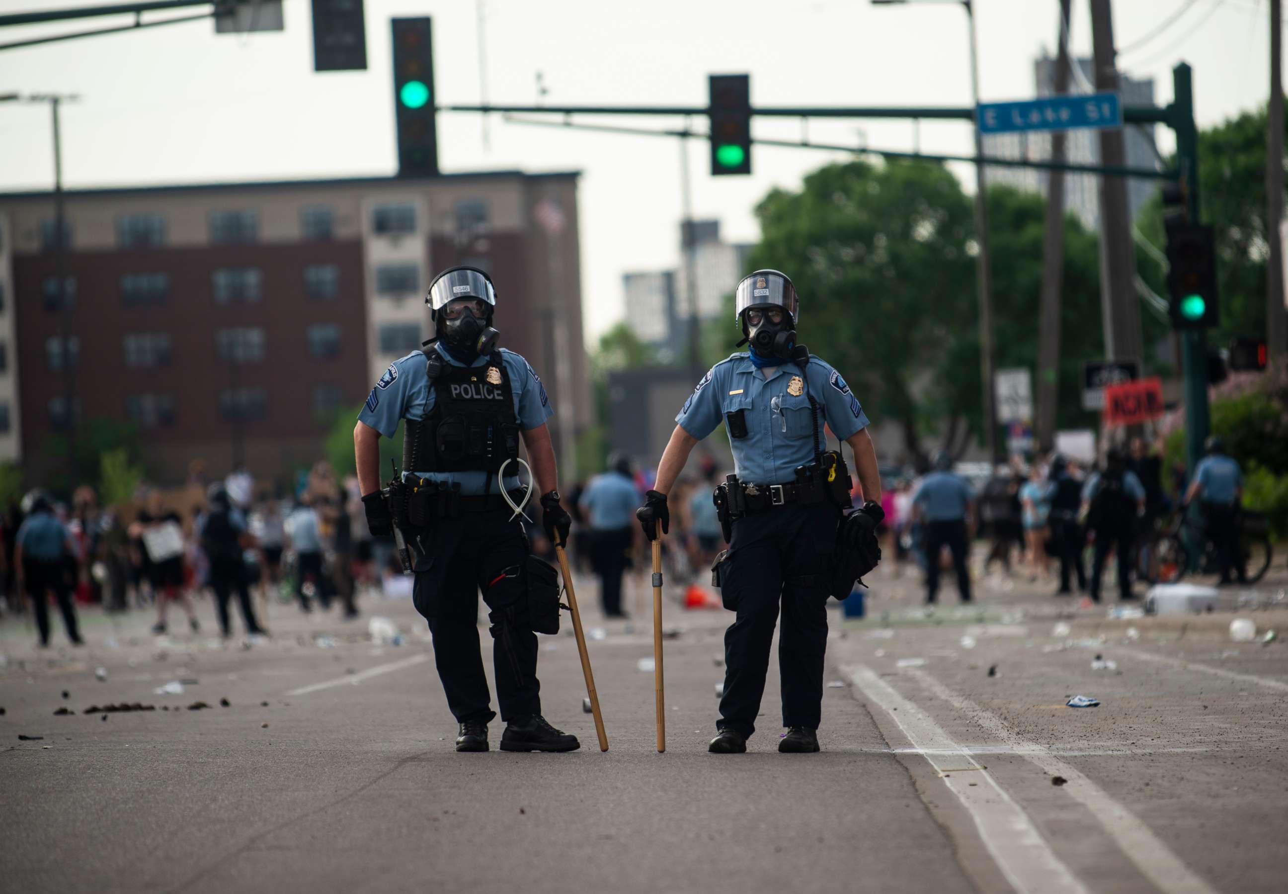 PHOTO: Police officers stand outside the Third Police Precinct during a protest on May 27, 2020, in Minneapolis.