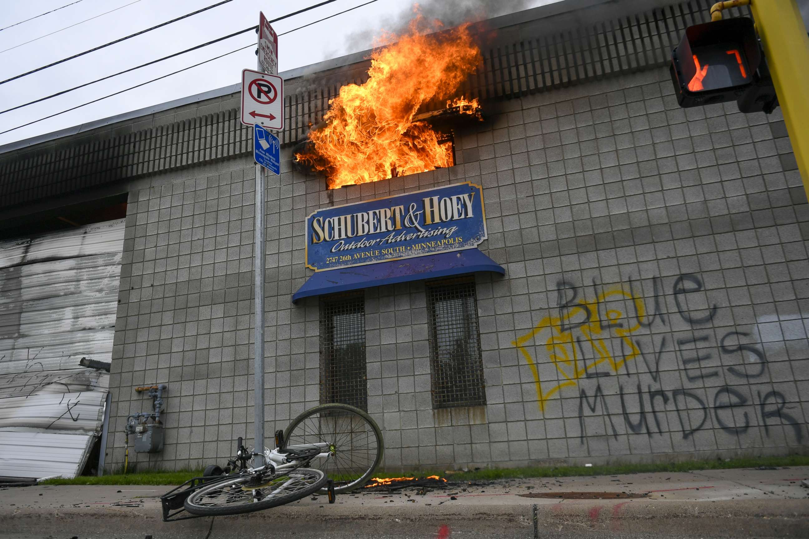 PHOTO: Fire engulfs a small shop with no firefighters available to help, as violence continues following protests over the death of George Floyd, in Minneapolis, Minnesota, May 29, 2020.