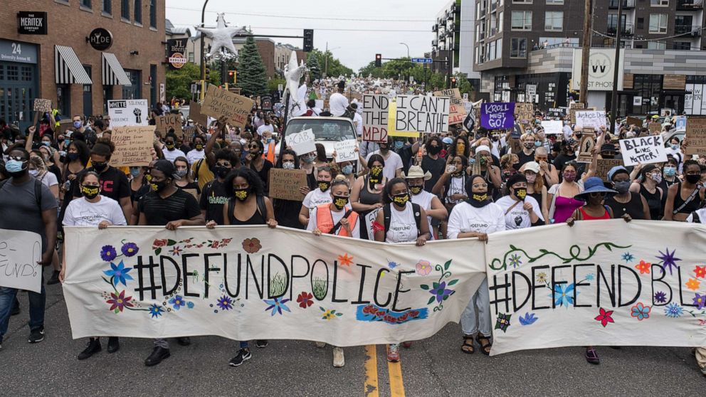 PHOTO: In this June 6, 2020, file photo, demonstrators calling to defund the Minneapolis Police Department march on University Avenue in Minneapolis.